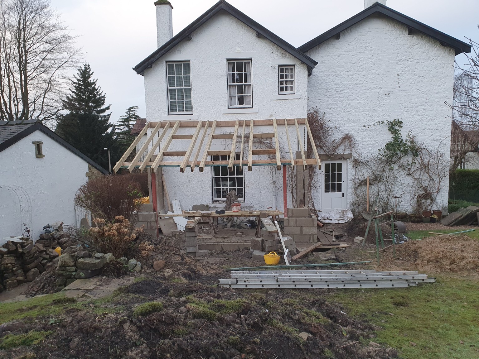 Timber roof structure under construction