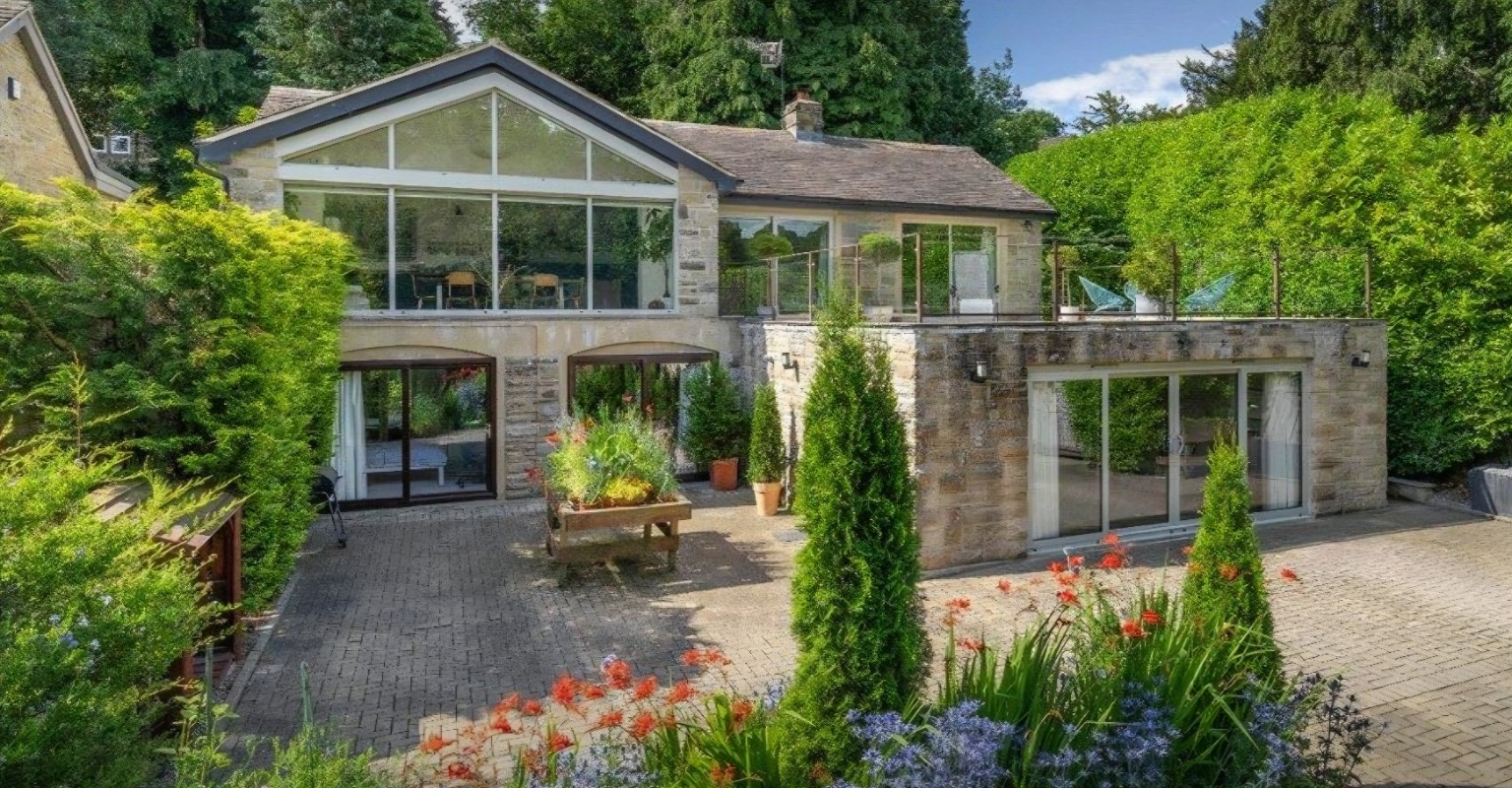 Completed Riverside Walk stone property and landscaped garden