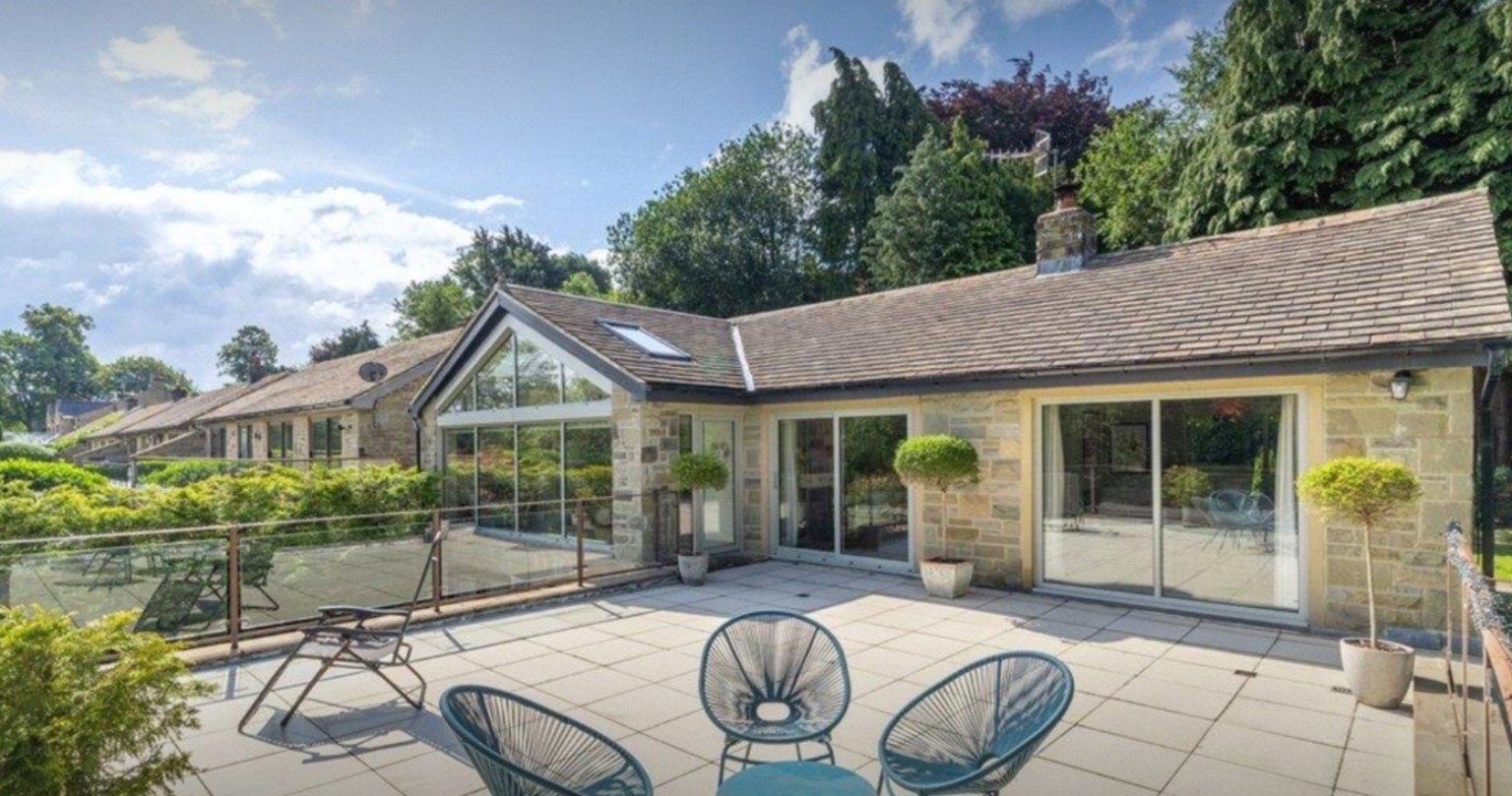 Elevated terrace and glazed gable at Riverside Walk